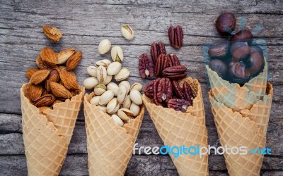 Concept For Homemade Various Nuts Ice Cream. Mixed Nuts In Waffl… Stock Photo