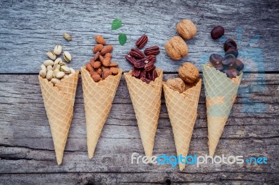 Concept For Homemade Various Nuts Ice Cream. Mixed Nuts In Waffl… Stock Photo