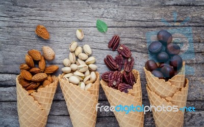 Concept For Homemade Various Nuts Ice Cream. Mixed Nuts In Waffl… Stock Photo