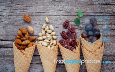 Concept For Homemade Various Nuts Ice Cream. Mixed Nuts In Waffl… Stock Photo