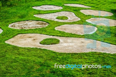 Concrete Parking Fied Mixed With Grasses Stock Photo