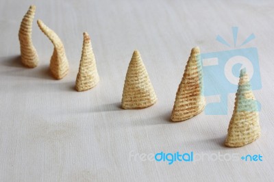 Cone Of Corns Snack On Wood Background Stock Photo