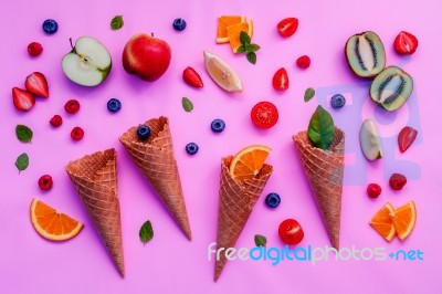 Cones And Colorful Various Fruits Raspberry ,blueberry ,strawber… Stock Photo