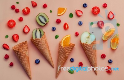 Cones And Colorful Various Fruits Raspberry ,blueberry ,strawber… Stock Photo