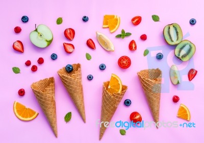 Cones And Colorful Various Fruits Raspberry ,blueberry ,strawber… Stock Photo