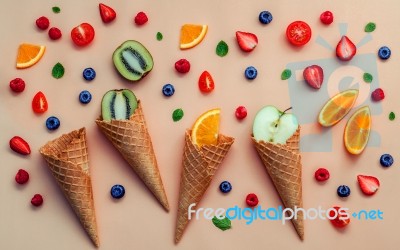 Cones And Colorful Various Fruits Raspberry ,blueberry ,strawber… Stock Photo