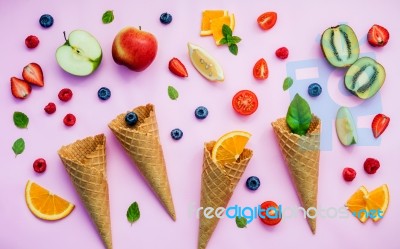 Cones And Colorful Various Fruits Raspberry ,blueberry ,strawber… Stock Photo