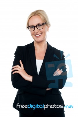 Confident Female Executive Wearing Eyeglasses Stock Photo