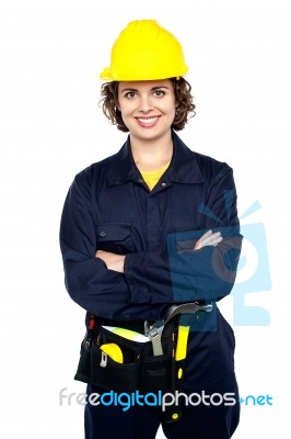 Confident Female Worker Posing With Arms Crossed Stock Photo