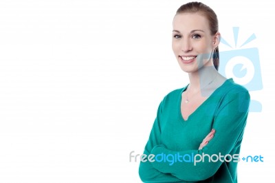 Confident Lady In Casuals With Arms Crossed Stock Photo