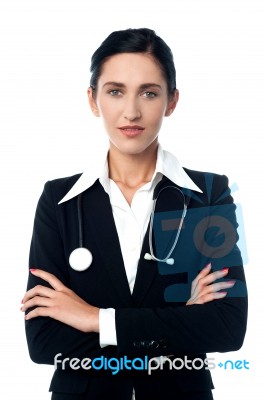 Confident Looking Lady Doctor, Arms Crossed Stock Photo