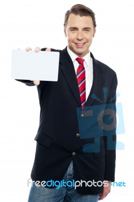 Confident Sales Representative Presenting Blank Placard Stock Photo