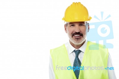 Confident Senior Architect With Jacket And Hard Hat Stock Photo