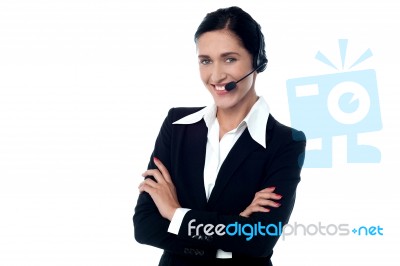 Confident Smiling Female Customer Support Staff Stock Photo