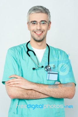 Confident Smiling Young Doctor Posing Stock Photo