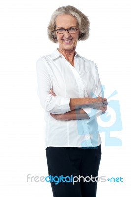 Confident Stylish Pose Of Smiling Woman Stock Photo
