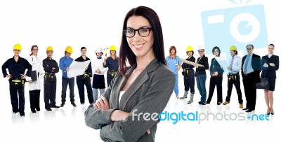 Confident Woman Leading A Business Team Stock Photo