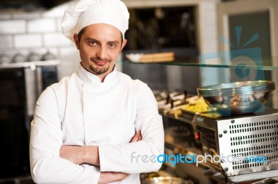 Confident Young Chef Posing Stock Photo