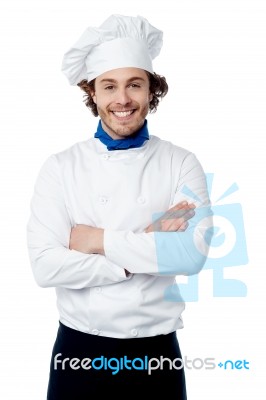 Confident Young Chef Posing In Uniform Stock Photo