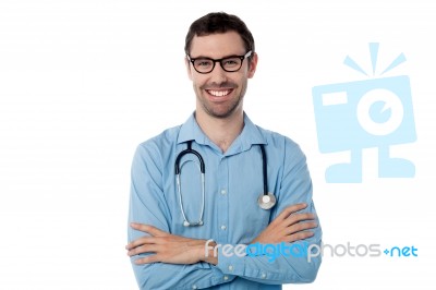 Confident Young Smiling Male Doctor Stock Photo