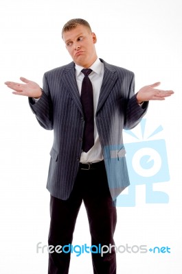 Confused Businessman Looking Aside Stock Photo