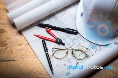 Construction Concept Image Helmet Rolled Blueprints On Wooden Bo… Stock Photo