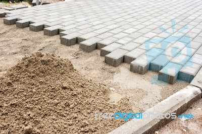 Construction Of A New Pavement Of Paving Slabs Stock Photo