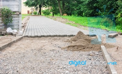 Construction Of A New Pavement Of Paving Slabs Stock Photo