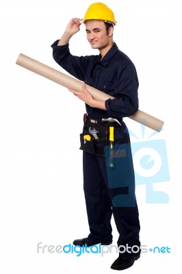 Construction Worker Holding Building Blueprint Stock Photo