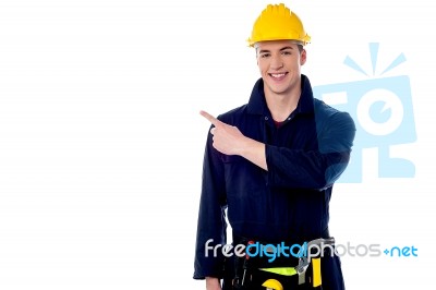 Construction Worker Pointing Away Stock Photo