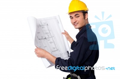 Construction Worker Reviewing Blueprint Stock Photo