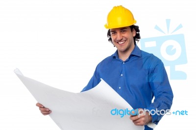 Construction Worker Reviewing Blueprint Stock Photo