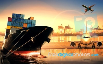 Container Ship In Import,export Port Against Beautiful Morning Light Of Loading Ship Yard Use For Freight And Cargo Shipping Vessel Transport Stock Photo