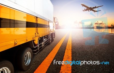 Container Truck And Ship In Import,export Harbor Port With Cargo Freight Plane Flying Use For Transport And Logistic ,shipping Business Background,backdrop Stock Photo