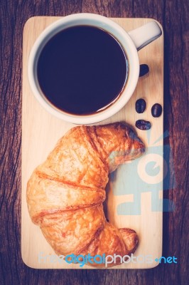 Continental Breakfast With Coffee And Croissant Stock Photo