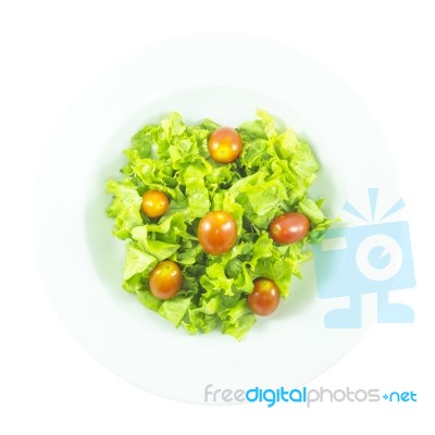 Contrast Salad With Red Tomato And Purple Lettuce Stock Photo