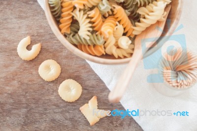 Cook Alphabet Biscuit With Fusili Pasta Stock Photo