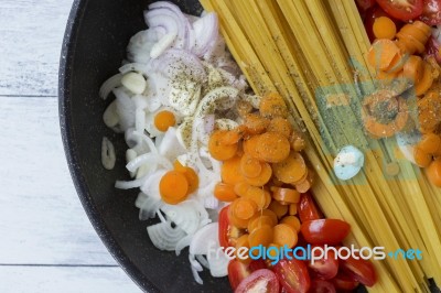 Cooking Spaghetti With Fresh Vegetable Stock Photo