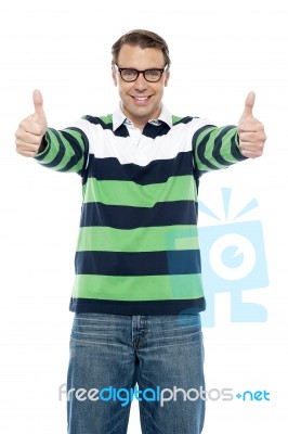 Cool Guy Showing Double Thumbs Up To Camera Stock Photo