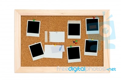 Corkboard With Empty Frame And Notes Stock Photo