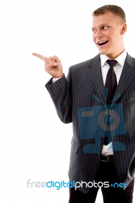 Corner View Of Pointing Businessman Stock Photo