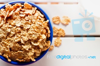 Cornflakes In A Blue Bowl Stock Photo