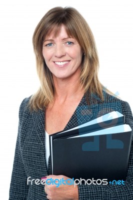 Corporate Executive Holding Important Documents Stock Photo
