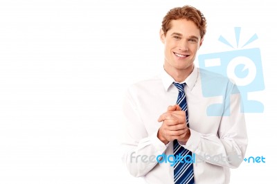 Corporate Guy Posing With Clasped Hands Stock Photo