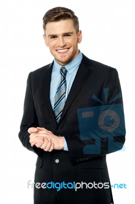 Corporate Guy Posing With Clasped Hands Stock Photo