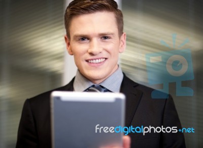 Corporate Guy Using Tablet Pc Stock Photo