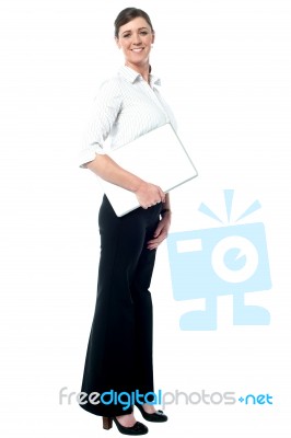 Corporate Lady Holding Laptop Stock Photo