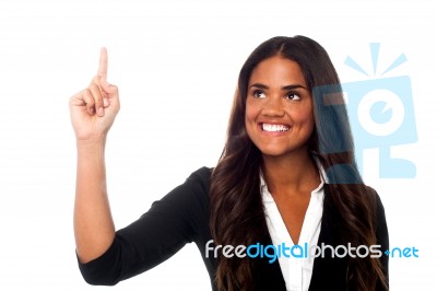 Corporate Lady Pointing Upwards Stock Photo