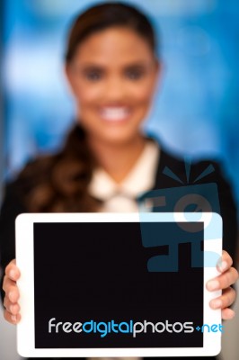 Corporate Lady Showing Tablet Device Stock Photo