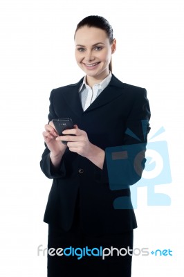 Corporate Lady Using Mobile Phone Stock Photo